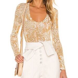 Free People X Revolve Gotcha bodysuit in Maize Intimately Free animal print